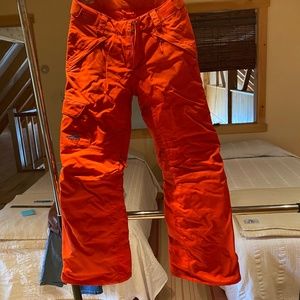 North face ski pants in orange